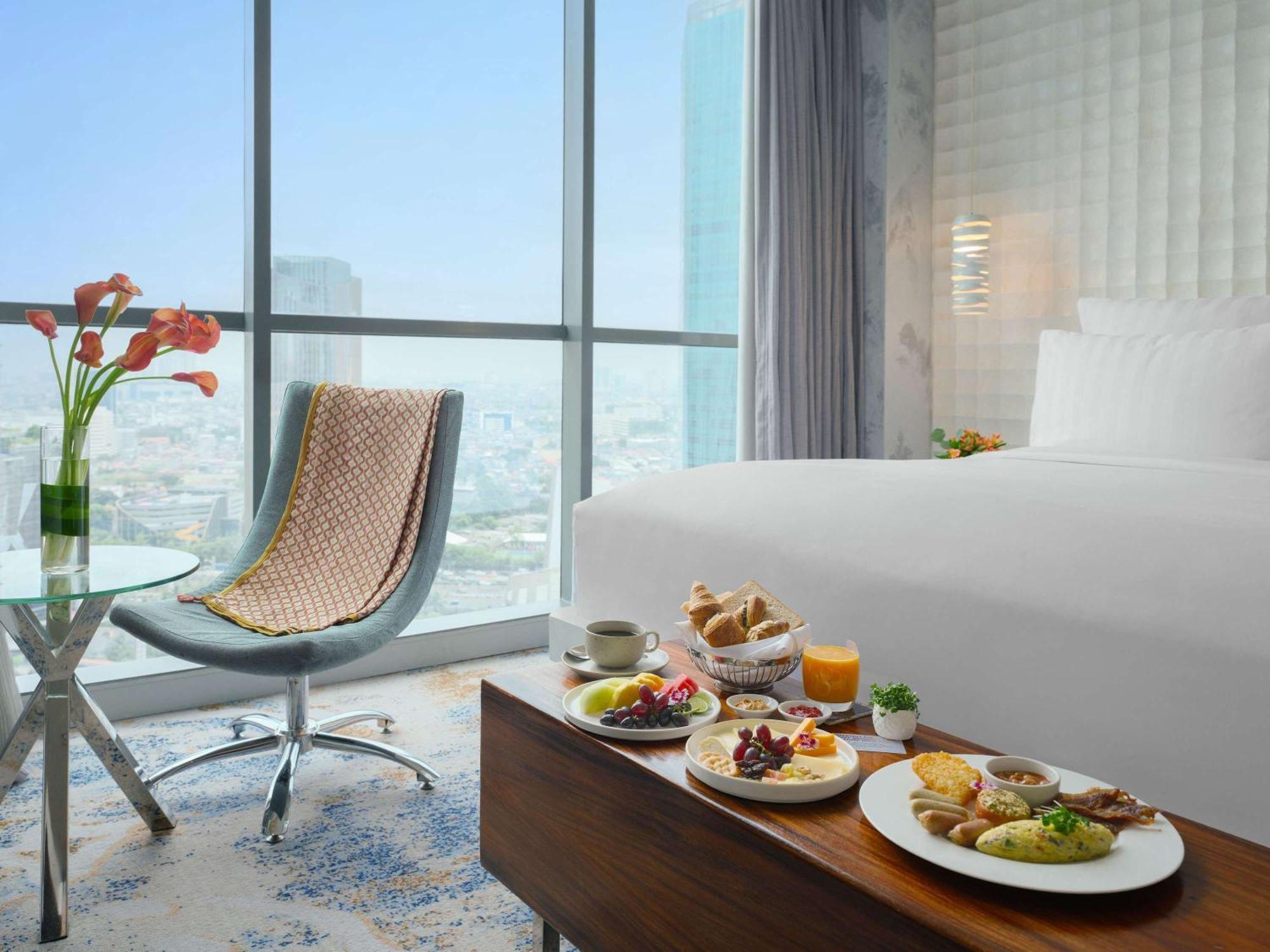 Pullman Jakarta Central Park Jacarta Exterior foto A suite at the hotel